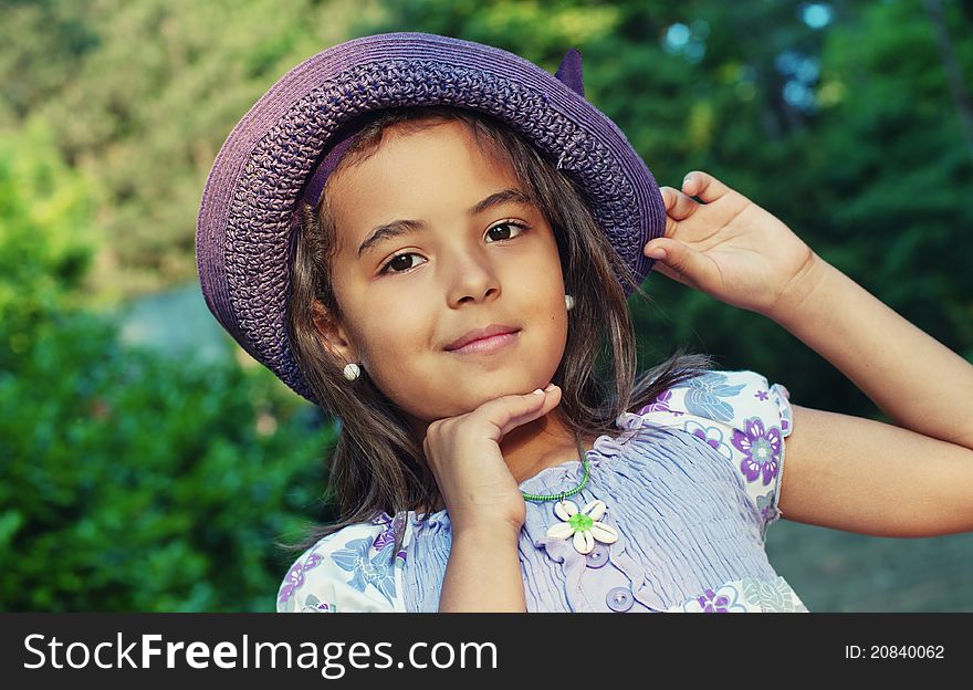 Portrait of happy little girl in a summer day. Portrait of happy little girl in a summer day