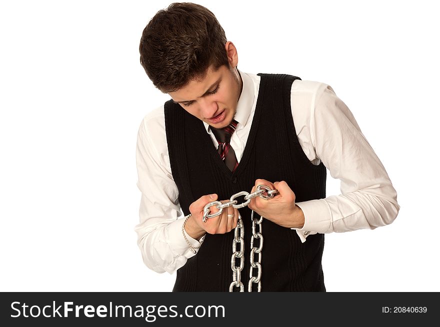 Businessman breaking the chain by hands for liberation as a symbol of work captivity
