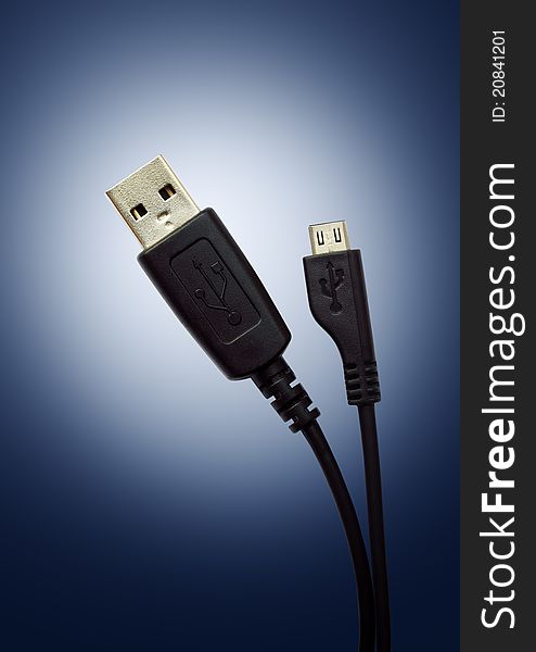Two USB Cable On Blue Background
