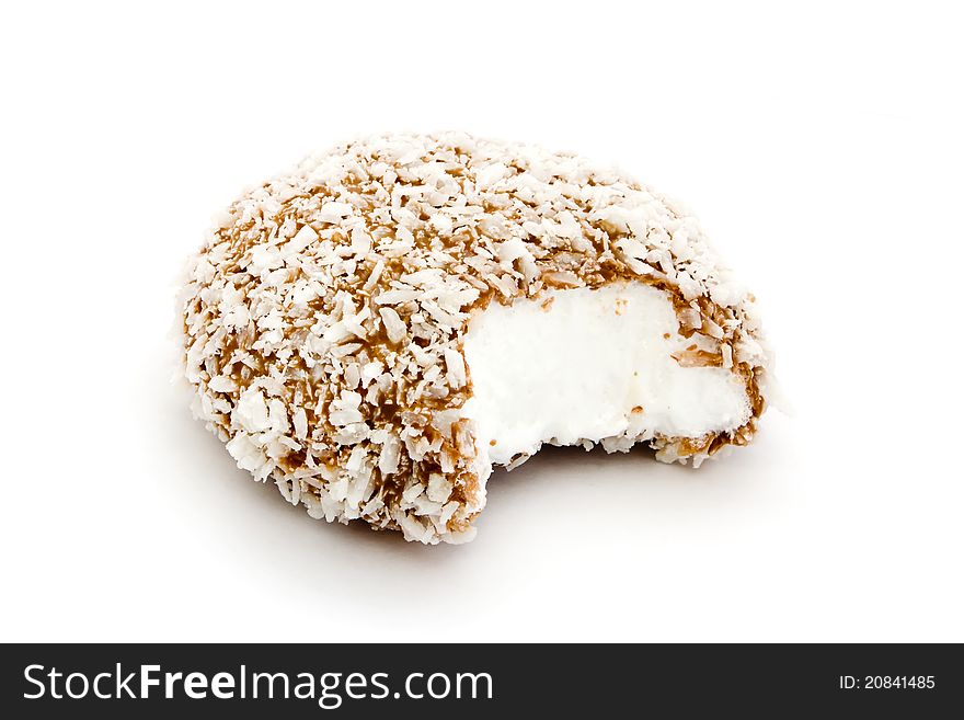 Chocolate and coconut covered marshmallow over white