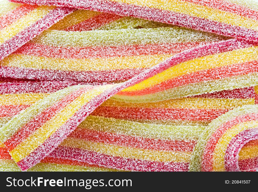Background of colorful liquorice sweet strips. Background of colorful liquorice sweet strips