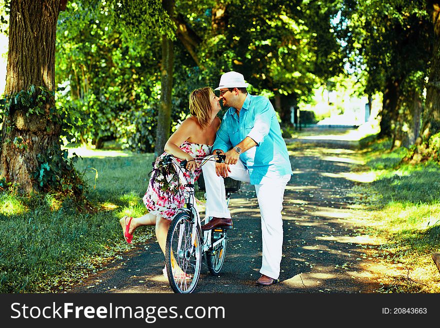 Middle aged couple flirting in a park