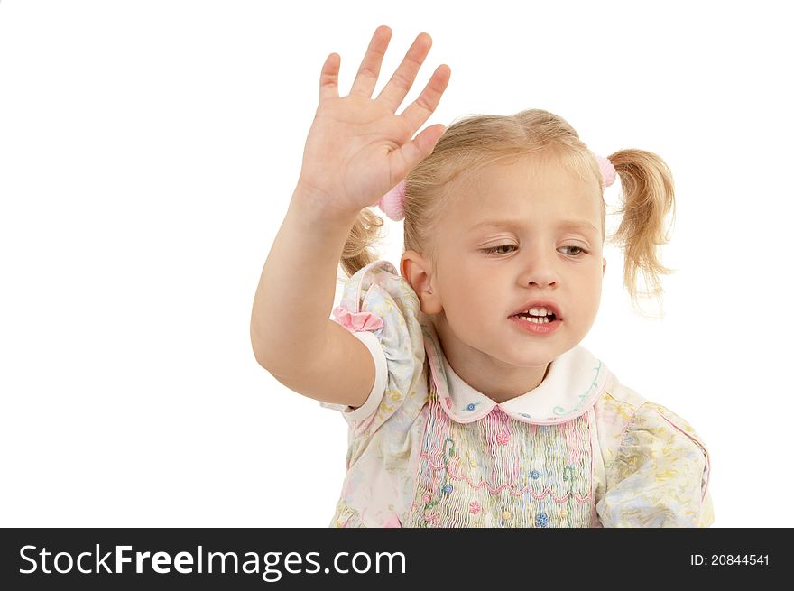 Cute little girl with arm raised annoyed on a white background