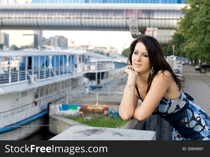 Girl walking on embankment