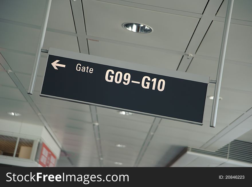 Gate sign in an airport in an airport terminal