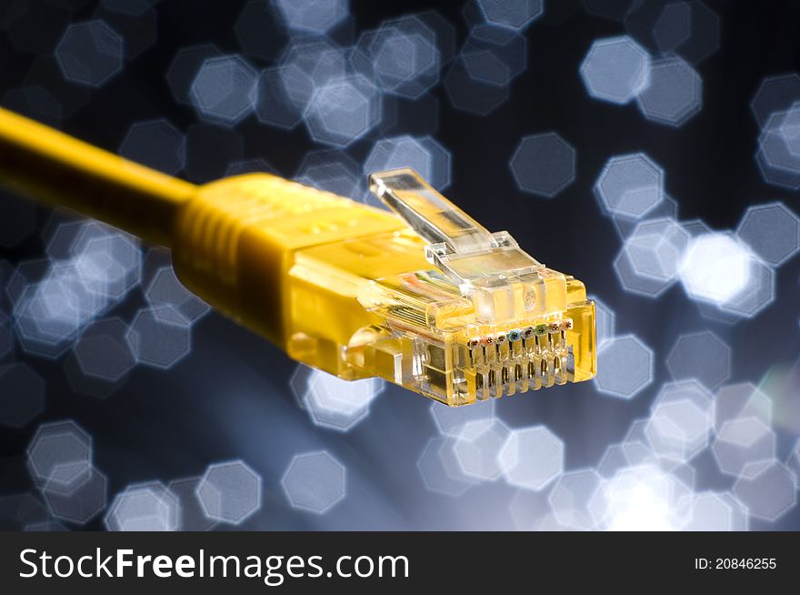 Ethernet cable on a dark blue Illuminated fiber background. Ethernet cable on a dark blue Illuminated fiber background.