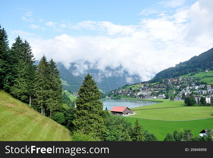 Swiss Landscape at the foot of Alps near mountain Titlis and village Engelberg