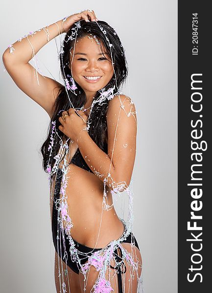 Adorable Model In Bathing Suit And Silly String