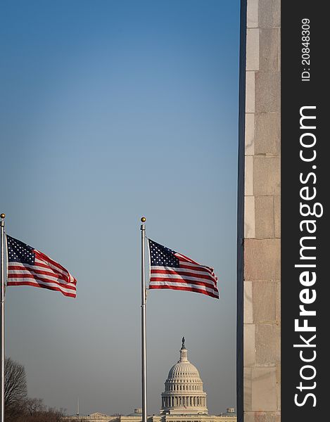 The Washington Monument and US Capitol in a day along with the USA flag. Washington DC