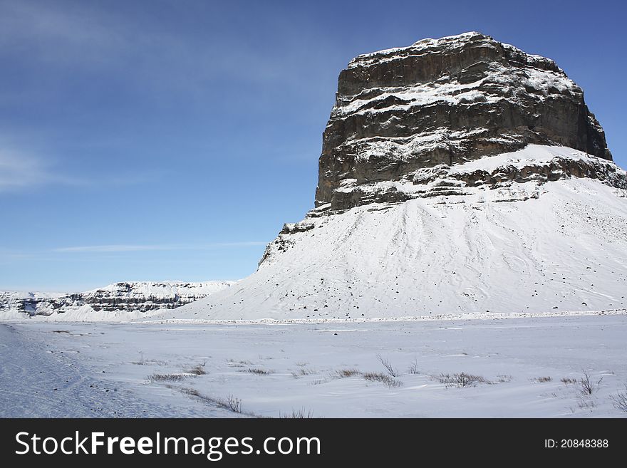 Big Rock In An Iceland Snow Landscape