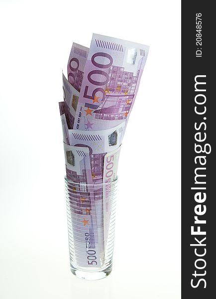 Glas filled with 500 euro bills. Glas filled with 500 euro bills
