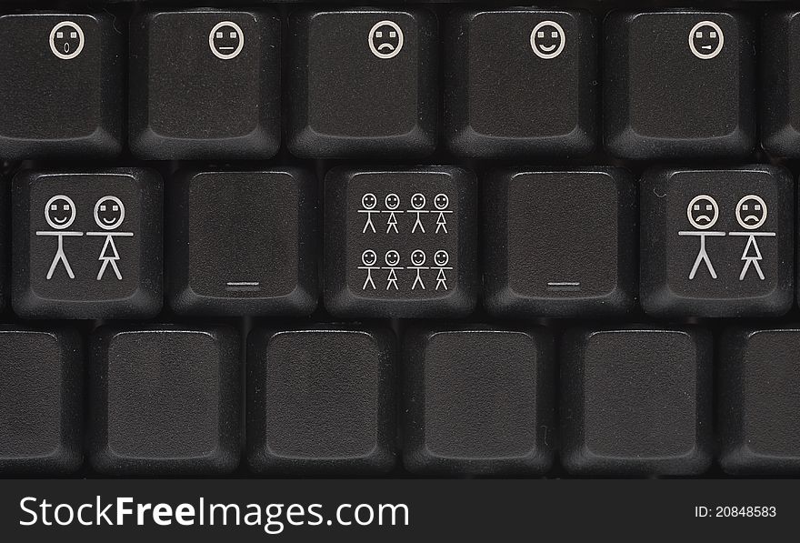 Black computer keyboard with smile key-happy family