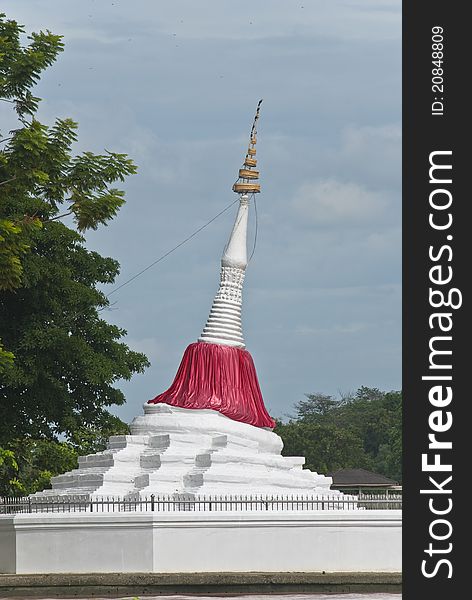 A white pagoda located at river side at nonthaburi province - Koh Kret, Thailand. A white pagoda located at river side at nonthaburi province - Koh Kret, Thailand