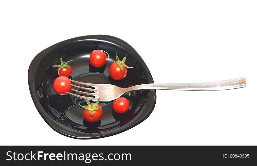 Tomatoes on the black plate