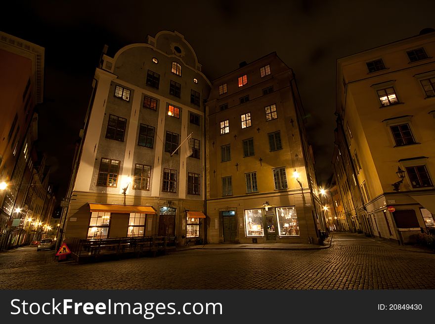 Two houses in the night in the middle of Stockholm