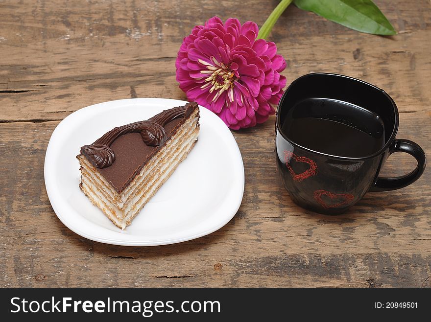 Tea with cakes on wood table