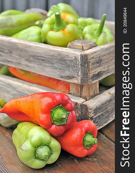 Peppers in a box on the table. Peppers in a box on the table.