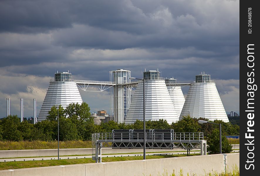 Heavy industry with dark clouds