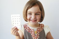 Little Girl With Medicaments In Her Hand Stock Photo Little Girl With Medicaments In Her Hand Stock Photo