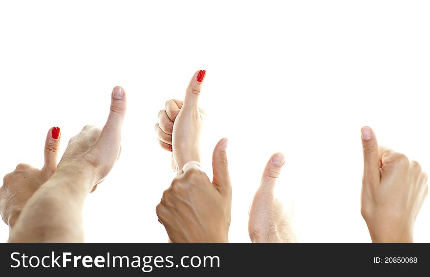 Many thumbs in front of a white background showing up
