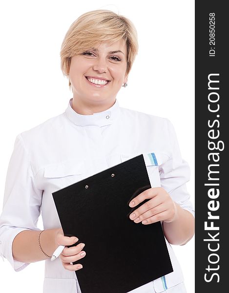 Portrait of smiling female doctor holding a clipboard - isolated over a white background