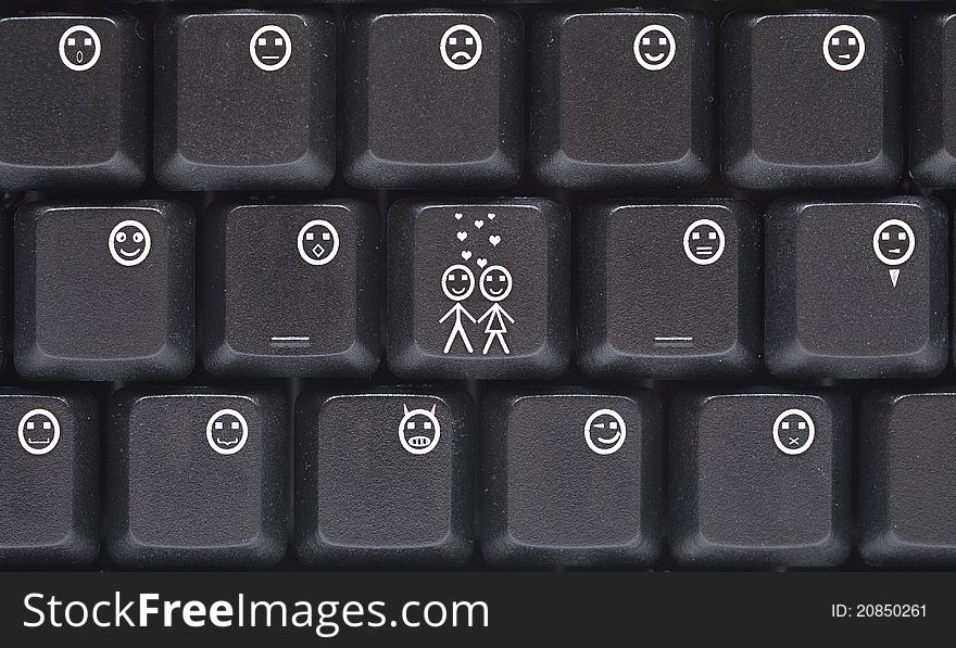 Computer keyboard closeup with smiley buttons. Computer keyboard closeup with smiley buttons