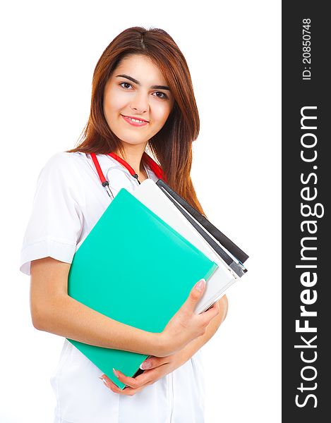 Young medical smiling woman doctor carrying medical files. Young medical smiling woman doctor carrying medical files