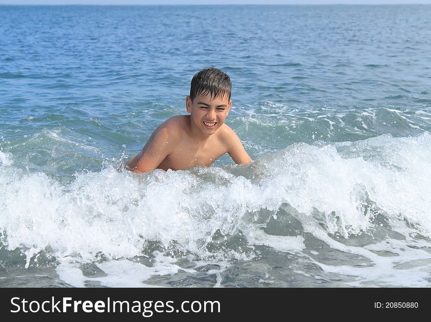 Boy In The Sea