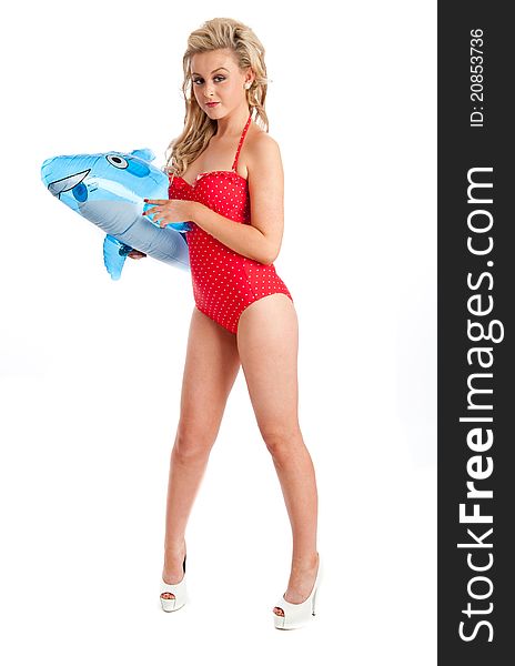 Image showing pretty female in red swimsuit and inflatable isolated against white. Image showing pretty female in red swimsuit and inflatable isolated against white