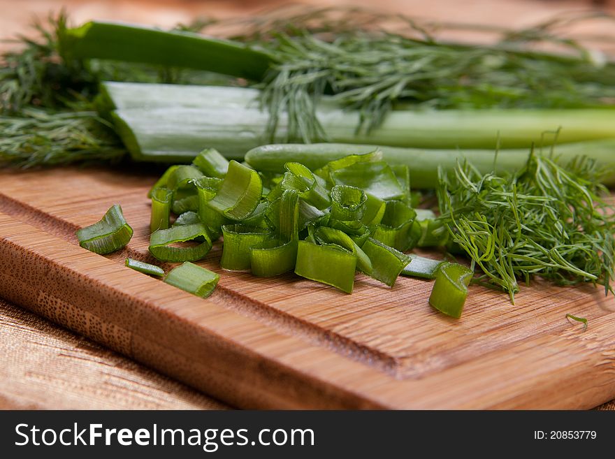 Dill, Parsley On Chopping Board