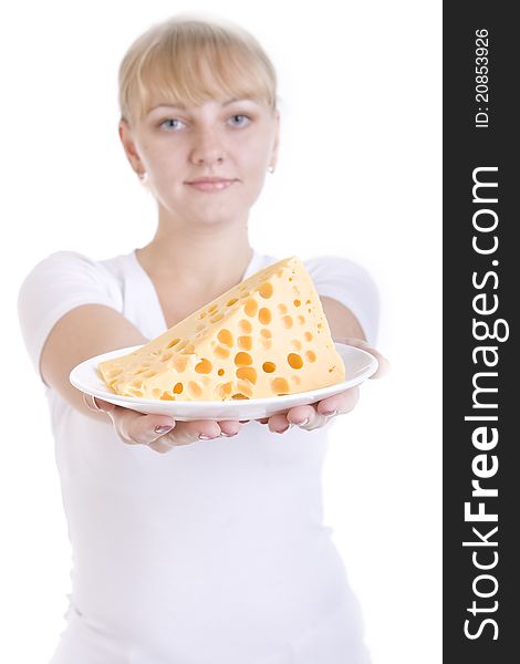 An attractive young blonde keeps on her outstretched hands a plate with cheese. An attractive young blonde keeps on her outstretched hands a plate with cheese