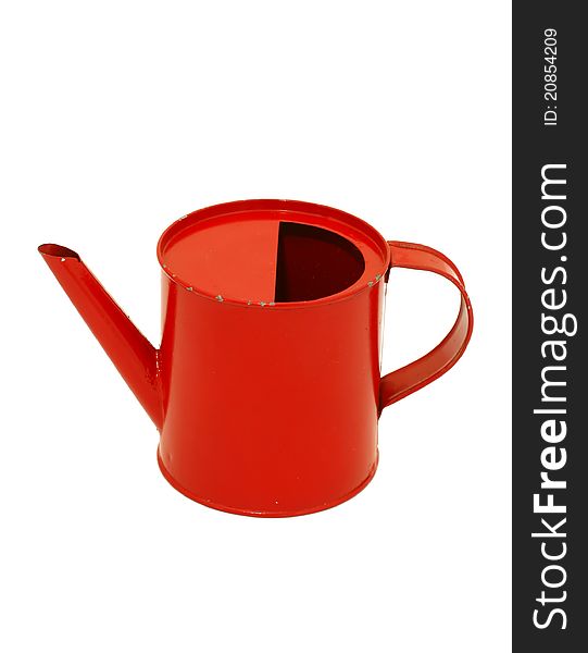 Old metal red watering can isolated on white background