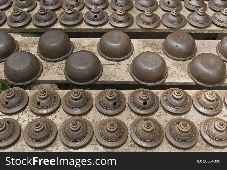 Pile of black pottery in a factory in Bangkok, Thailand