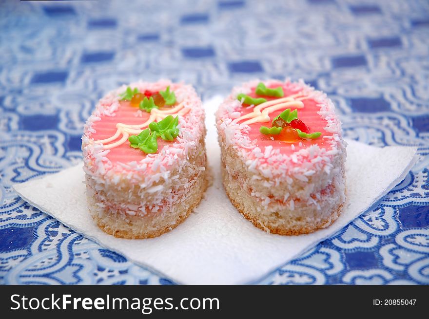 Two Tasty Beautiful Cakes In Cafe