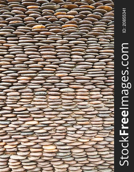 Close up of circle pebble wall,abstract background