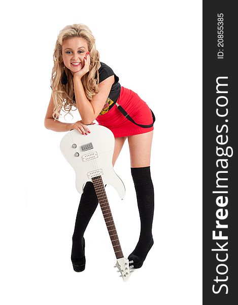 Image showing pretty blonde female posing against white with guitar. Image showing pretty blonde female posing against white with guitar