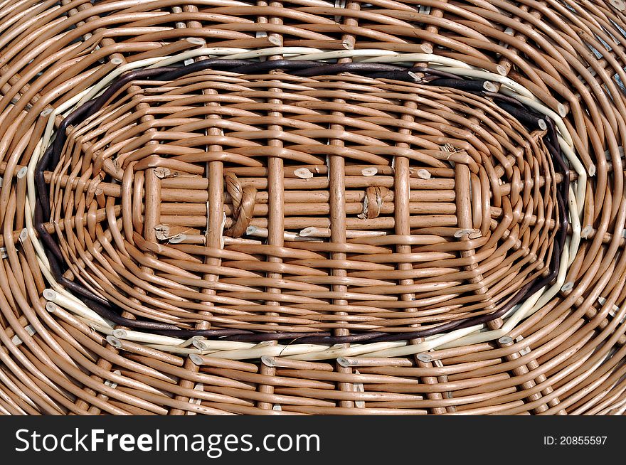 Wicker lid on the basket of brown willow. Wicker lid on the basket of brown willow