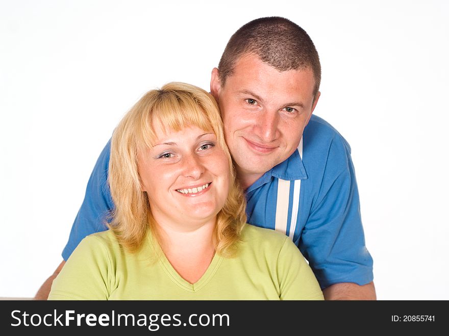 Portrait of a cute couple on a white. Portrait of a cute couple on a white