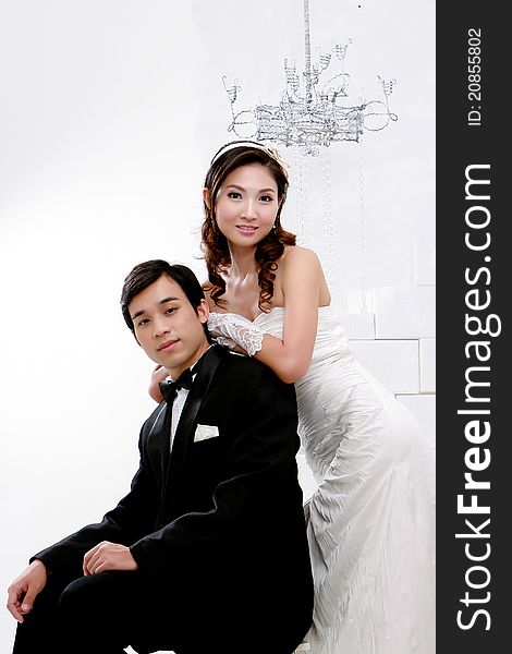 Portrait of young bride and groom in romentic emotion