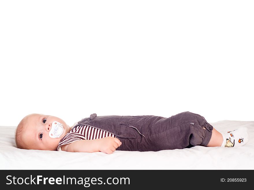 Portrait of a cute baby on a white. Portrait of a cute baby on a white