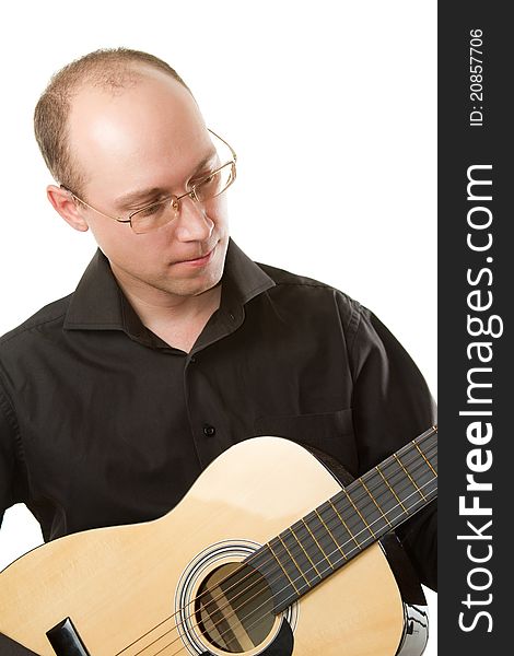 Singer in a black shirt and sunglasses playing guitar on white background. Singer in a black shirt and sunglasses playing guitar on white background
