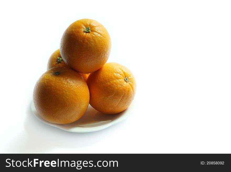 Sunkist orange in white plate and white background