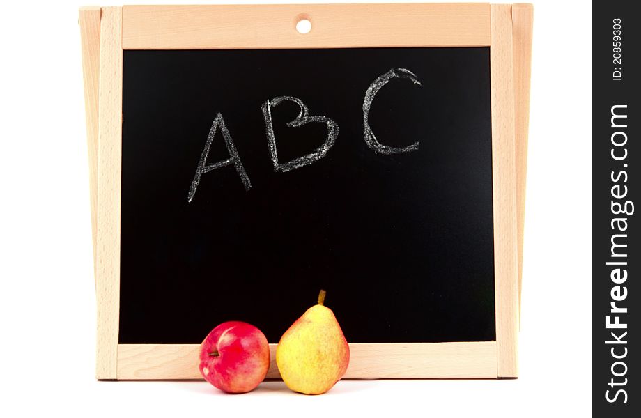 School board and fruits on white background