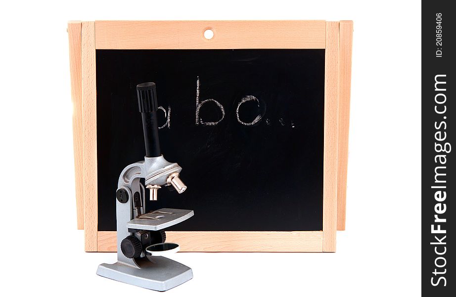 School board with a microscope on a white background