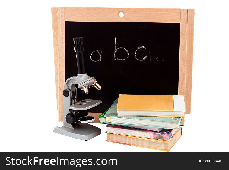 Blackboard with books on white background