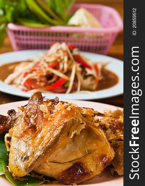 Fresh barbecue chicken,Thai papaya salad and vegetable on the table