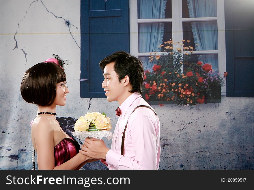 Portrait of young happy couple in lovely action and romentic emotion