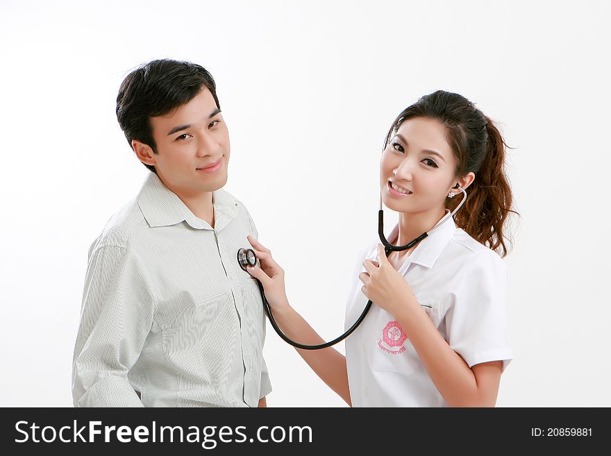 Portrait of young couple physician with Stethoscope and his boyfriend. Portrait of young couple physician with Stethoscope and his boyfriend