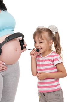 Pregnant Woman With Her Daughter Royalty Free Stock Image