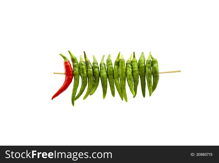 Green chili on white background